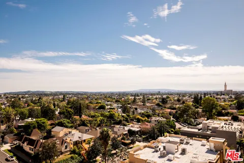 a view of a city with tall buildings