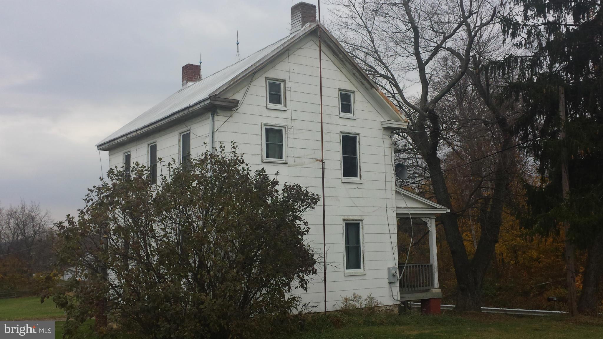4022 Millers Station Road Manchester, MD 21102 - Photo 2 of 5 a view of house with a yard