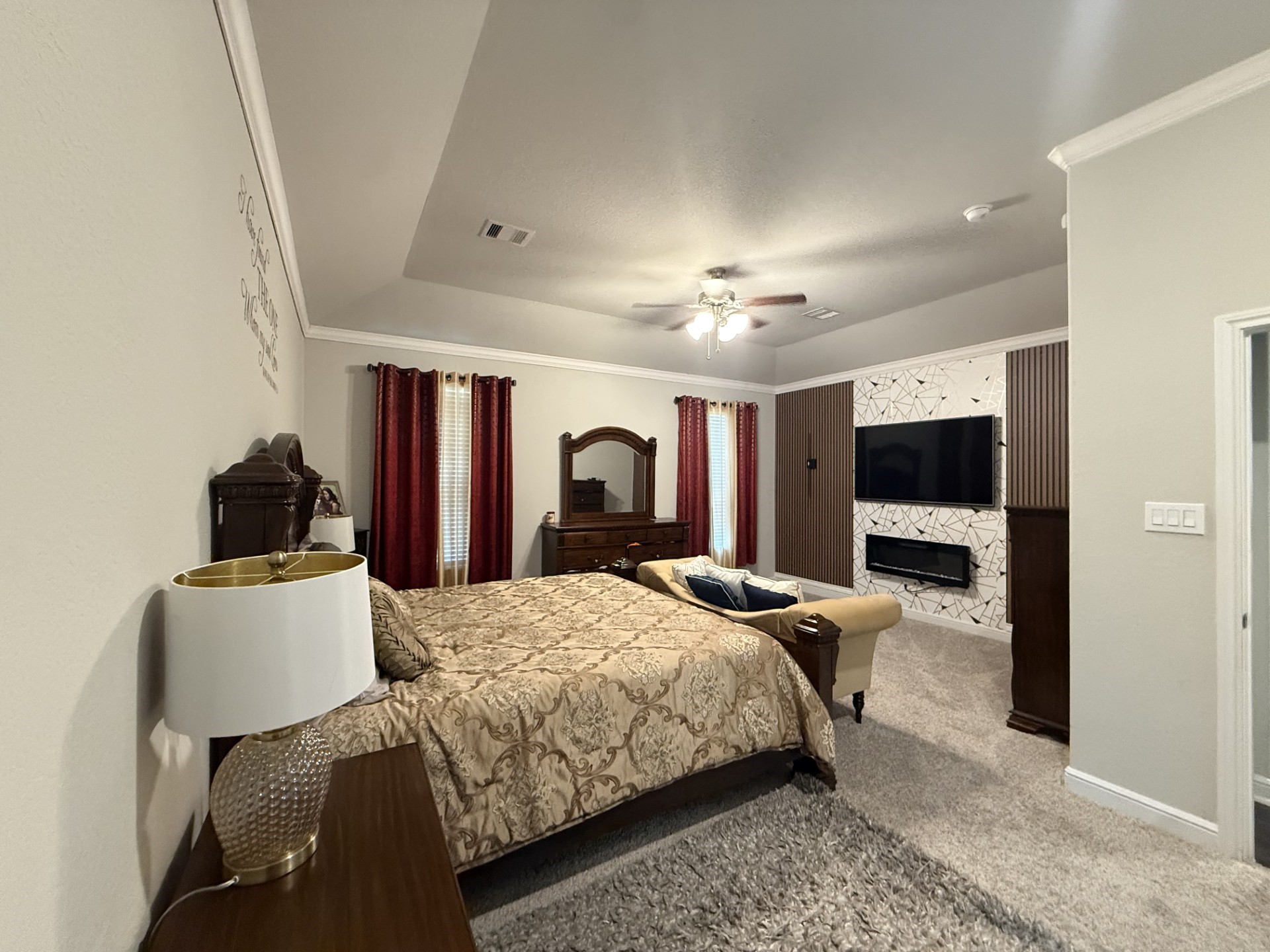 4811 Lacebark Pne Trail Rosenberg, TX 77471 - Photo 13 of 31 a bedroom with a bed and a flat screen tv