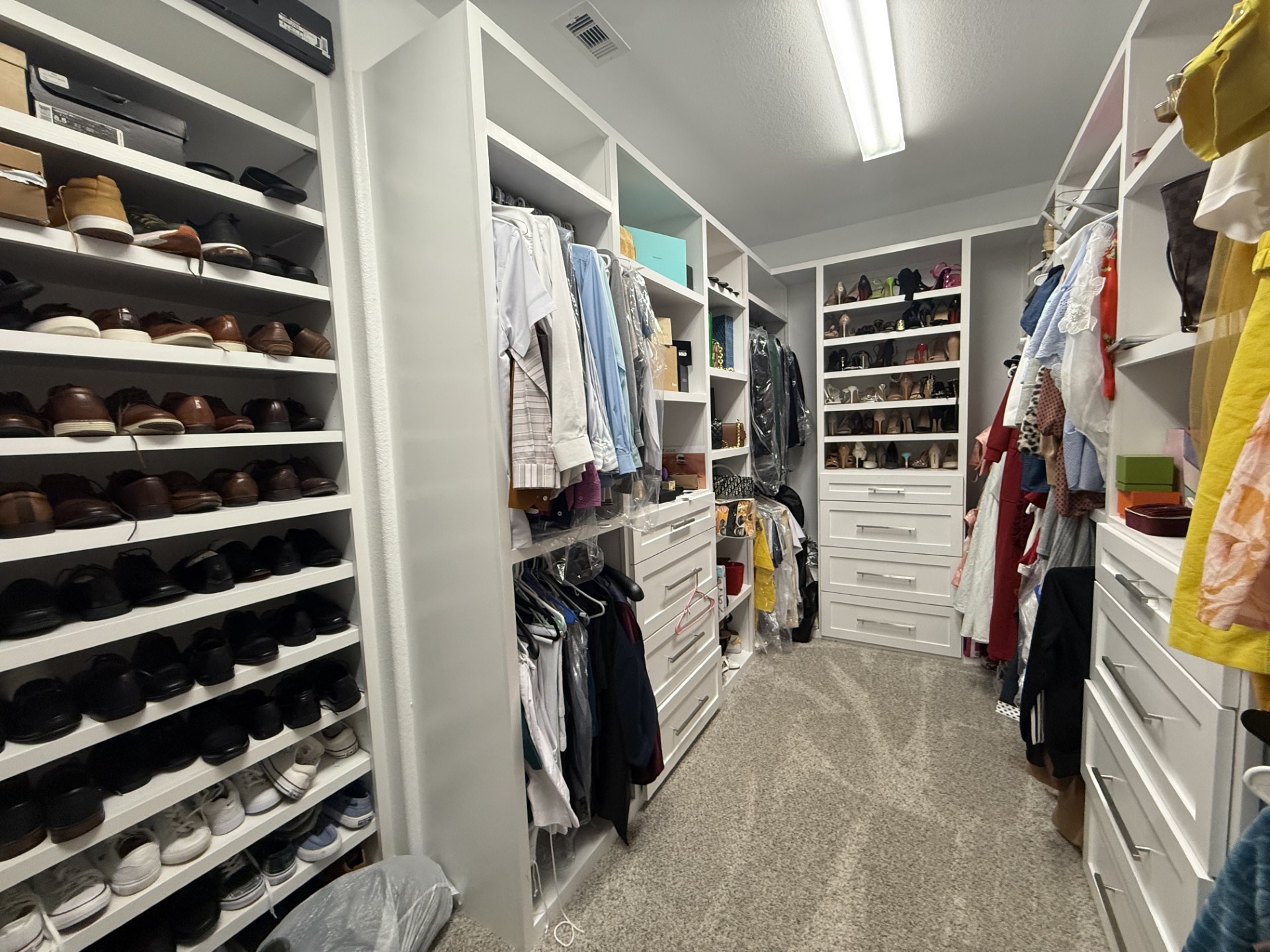 4811 Lacebark Pne Trail Rosenberg, TX 77471 - Photo 15 of 31 a view of walk in closet with clothes and shoes