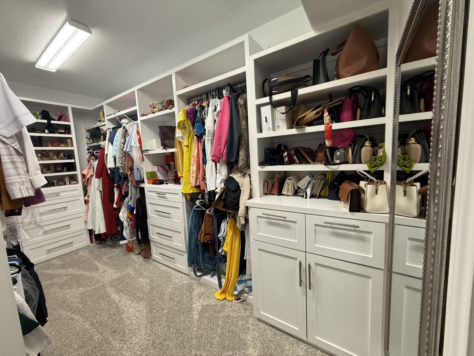 4811 Lacebark Pne Trail Rosenberg, TX 77471 - Photo 16 of 31 a view of walk in closet with clothes and shoes