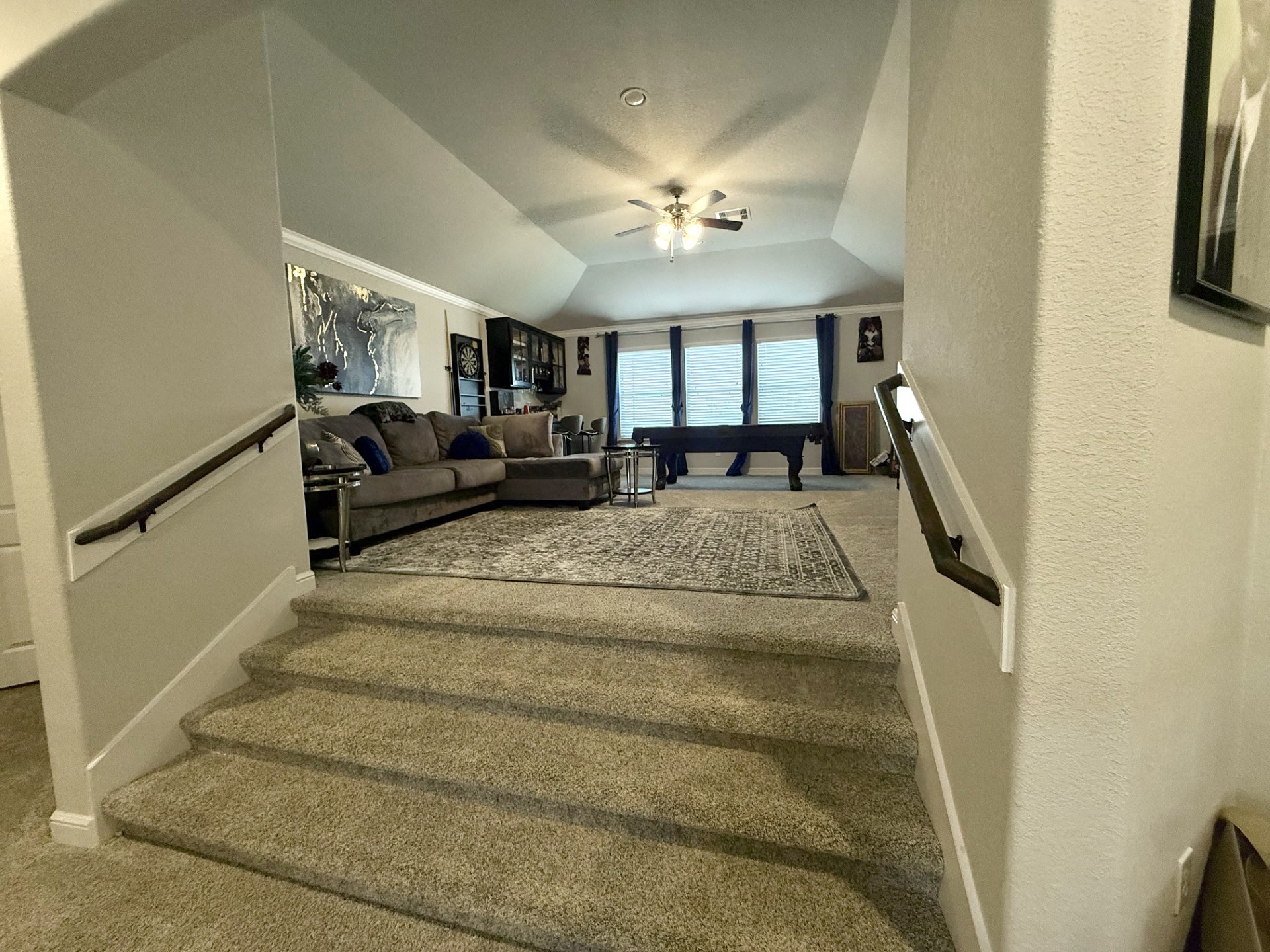 4811 Lacebark Pne Trail Rosenberg, TX 77471 - Photo 17 of 31 a living room with furniture and a chandelier