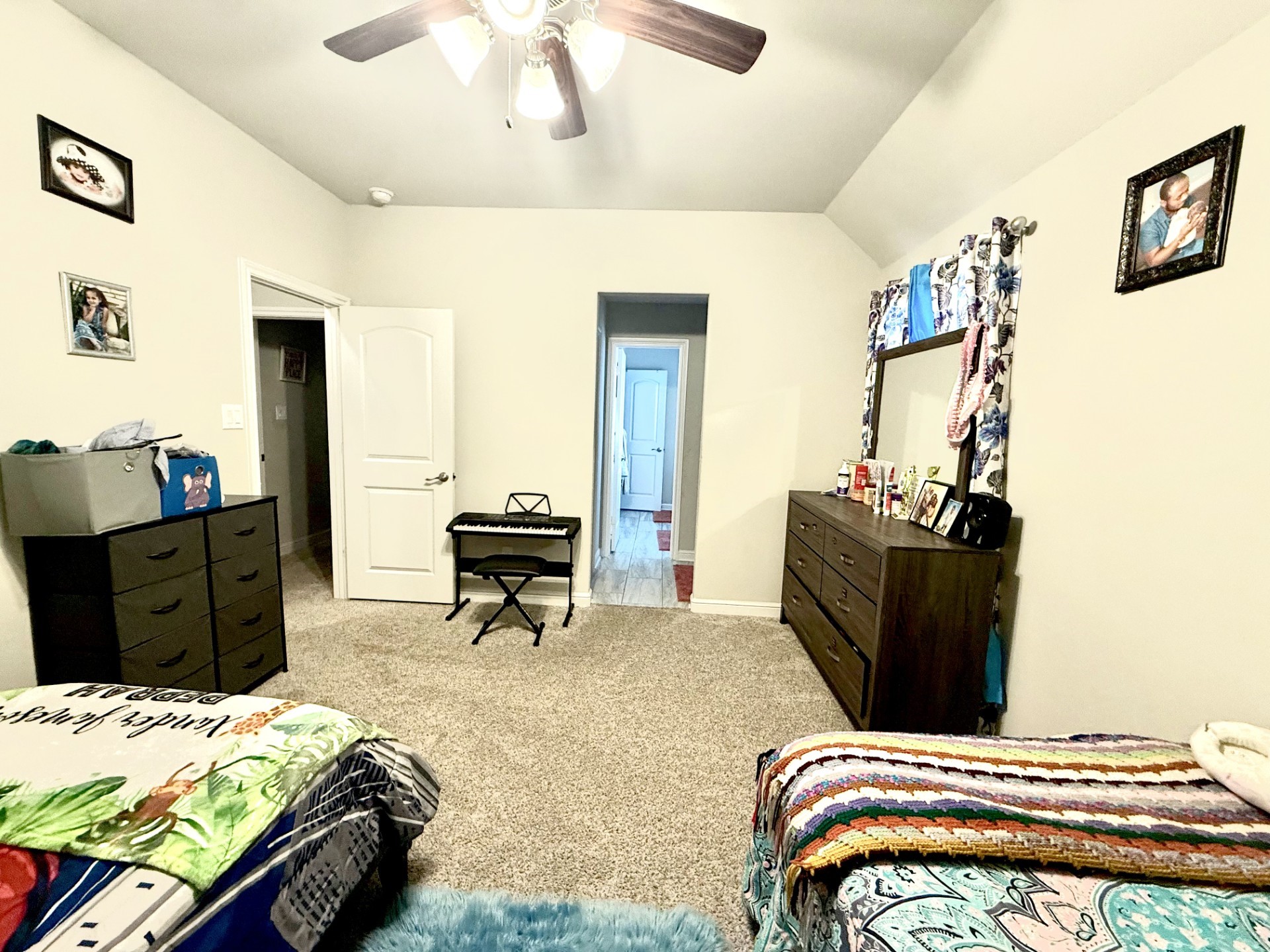 4811 Lacebark Pne Trail Rosenberg, TX 77471 - Photo 21 of 31 a bedroom with a bed and wooden floor