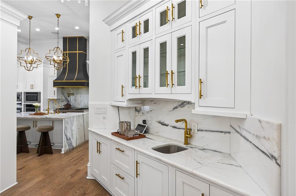 5320 Riverview Road Northwest Atlanta, GA 30339 - Photo 10 of 83 a kitchen with stainless steel appliances granite countertop a sink and cabinets