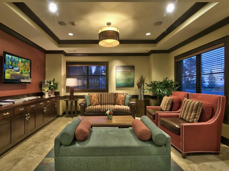 13051 Ritz Carlton Highlands Court, Unit 4308 INTEREST 8 Truckee, CA 96161 - Photo 7 of 26 a living room with furniture fireplace and a flat screen tv