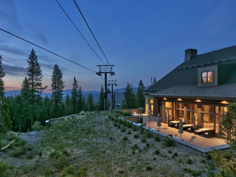 13051 Ritz Carlton Highlands Court, Unit 4308 INTEREST 8 Truckee, CA 96161 - Photo 8 of 26 a backyard of a house with barbeque oven table and chairs