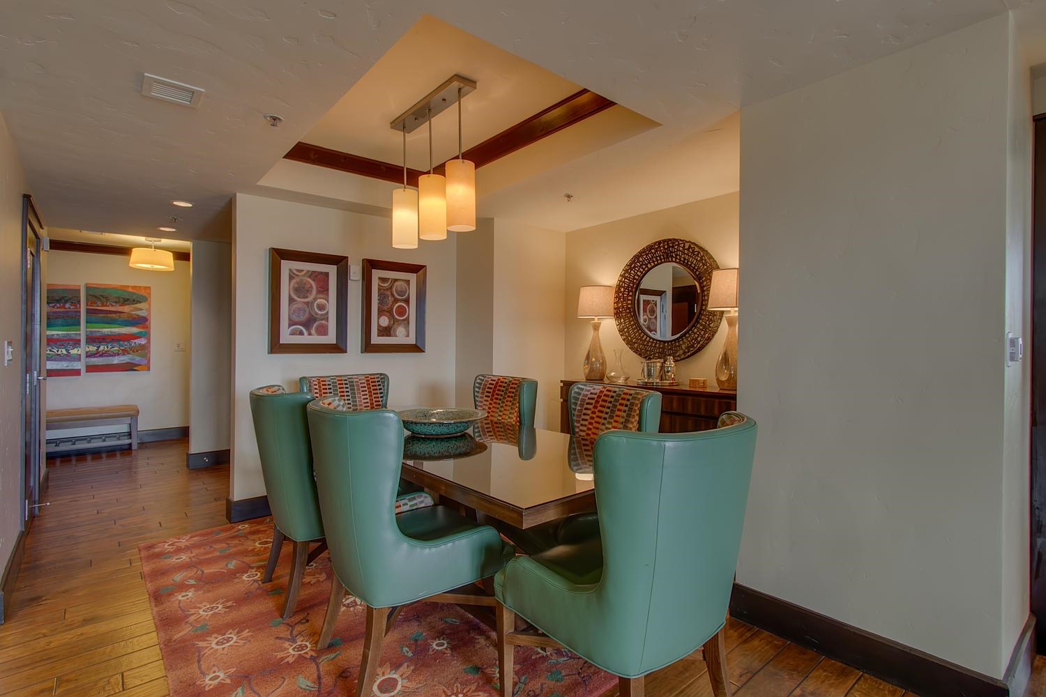 13051 Ritz Carlton Highlands Court, Unit 4308 INTEREST 8 Truckee, CA 96161 - Photo 9 of 26 a view of a dining room with furniture and wooden floor