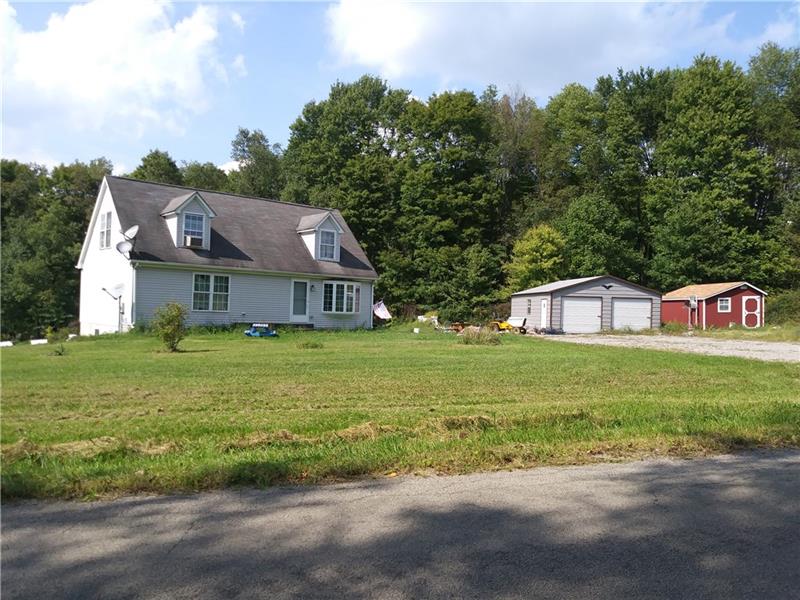 105 Elliott Road Grove City, PA 16127 - Photo 1 of 20 Spacious, Custom-built 4 bedroom Cape Cod on 3+acres in Grove City Area School District! Two car detached metal garage and separate red barn for loads of storage.