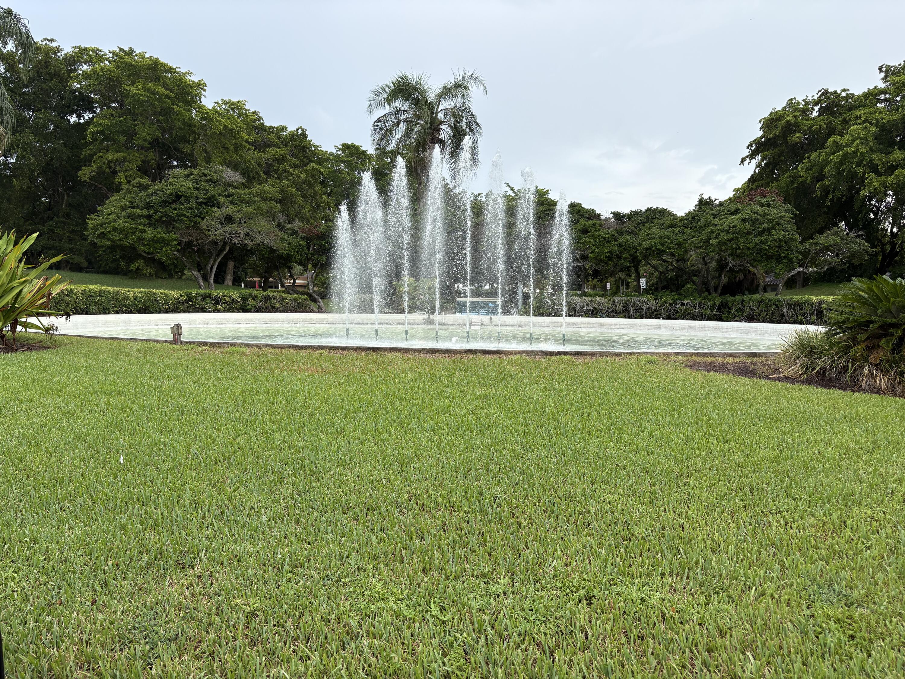 5904 Cedar Circle Tamarac, FL 33319 - Photo 2 of 23 a view of a city with tall trees