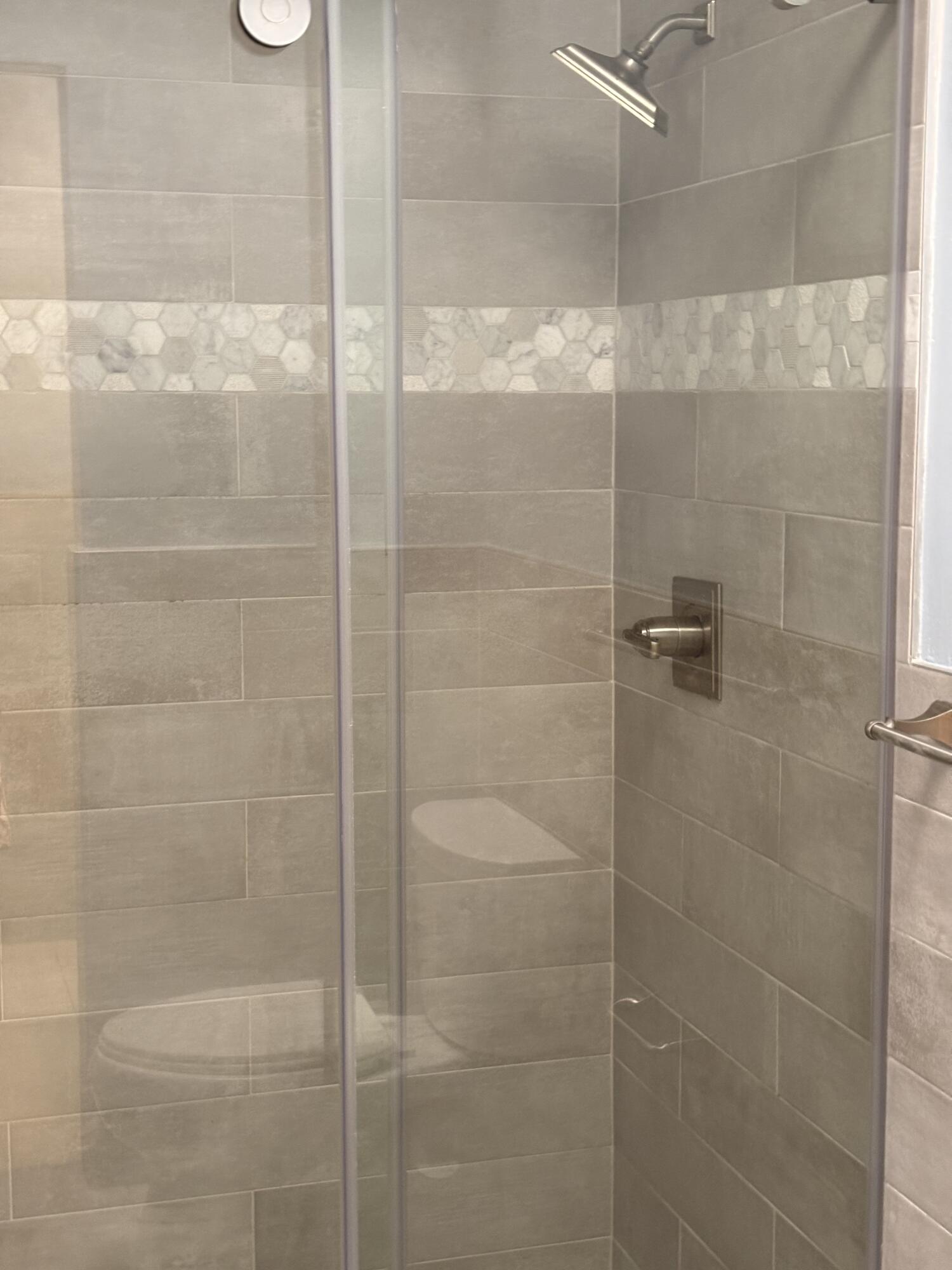 5904 Cedar Circle Tamarac, FL 33319 - Photo 23 of 23 a bathroom with a shower