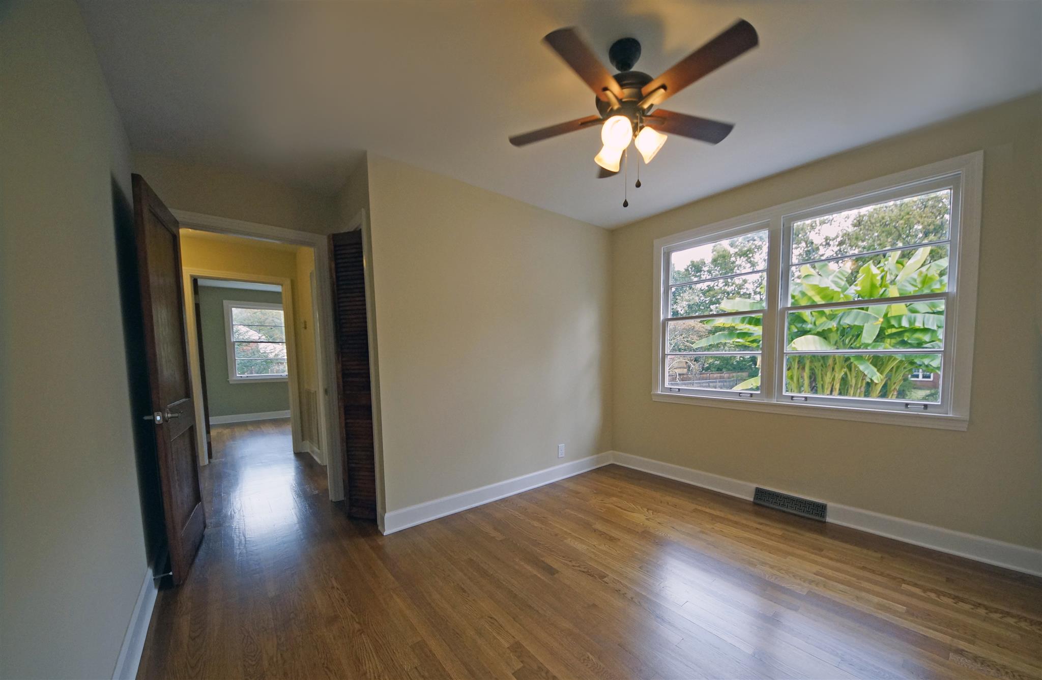 807 River Pass Madison, TN 37115 - Photo 13 of 25 a view of empty room with wooden floor and fan