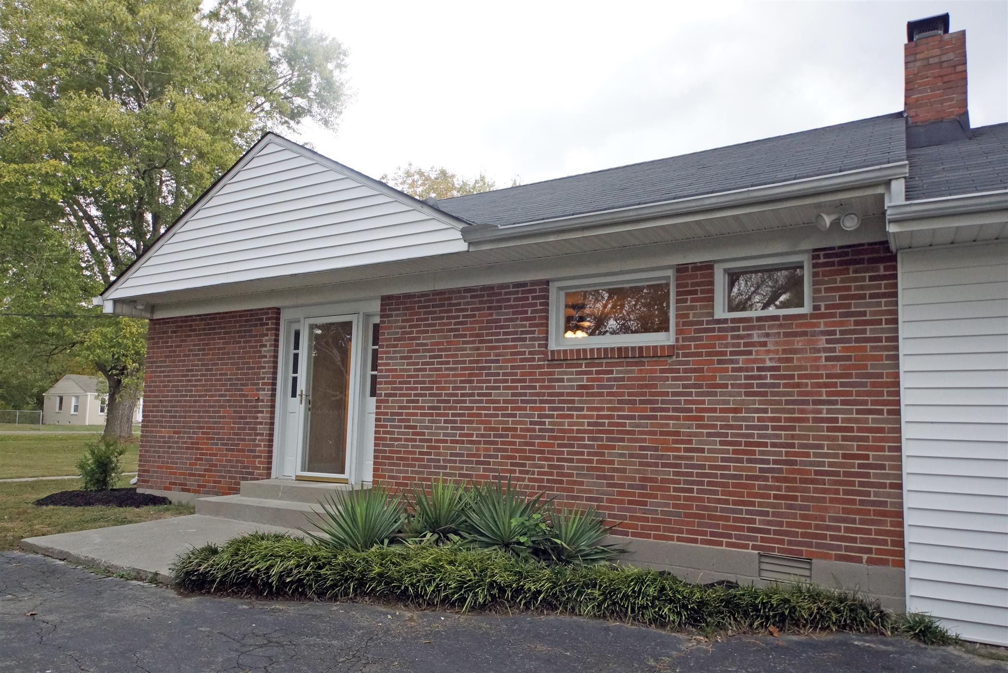 807 River Pass Madison, TN 37115 - Photo 16 of 25 a front view of a house with a yard