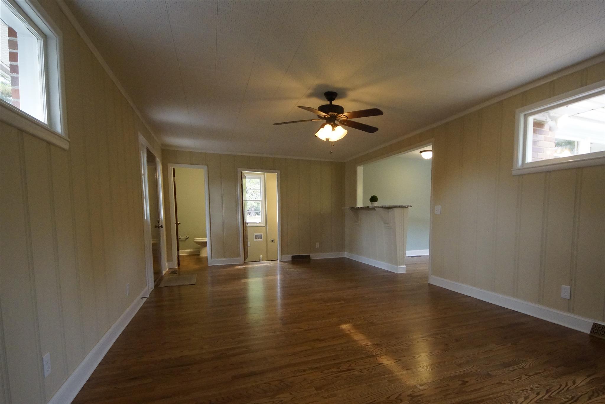 807 River Pass Madison, TN 37115 - Photo 19 of 25 a view of an empty room with window and wooden floor