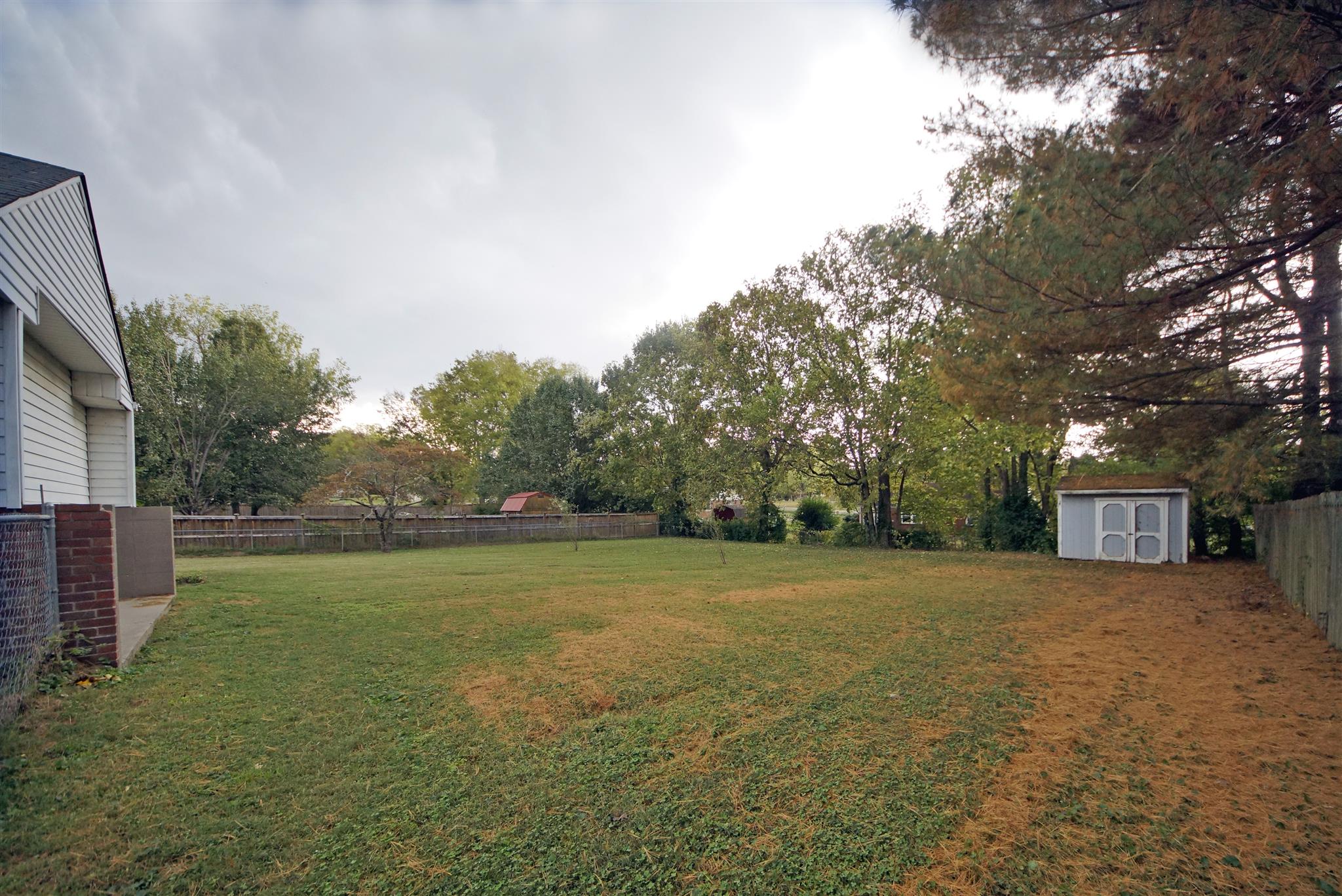 807 River Pass Madison, TN 37115 - Photo 24 of 25 a view of a field with trees in the background