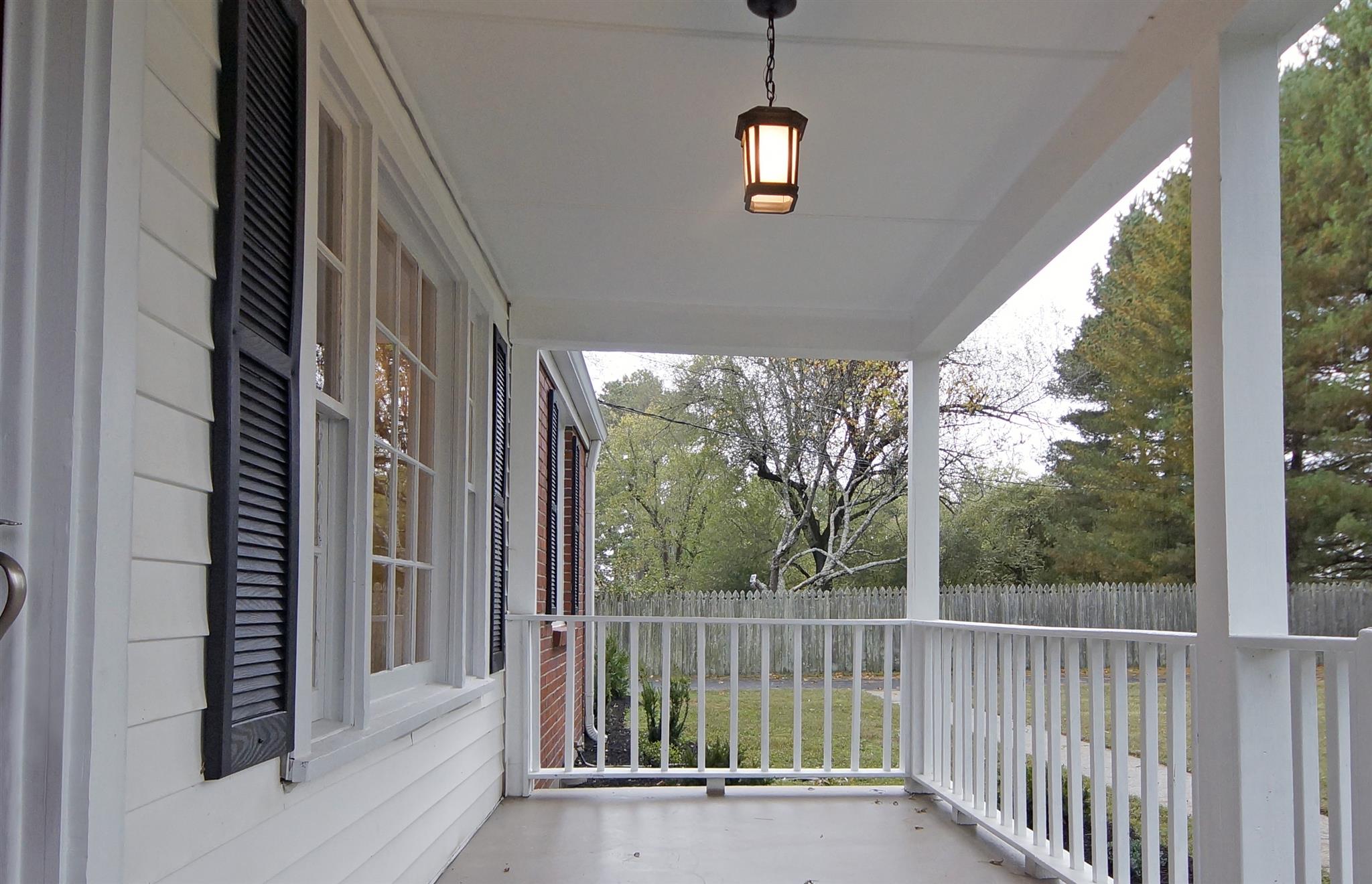 807 River Pass Madison, TN 37115 - Photo 3 of 25 a view of a porch with a floor to ceiling window