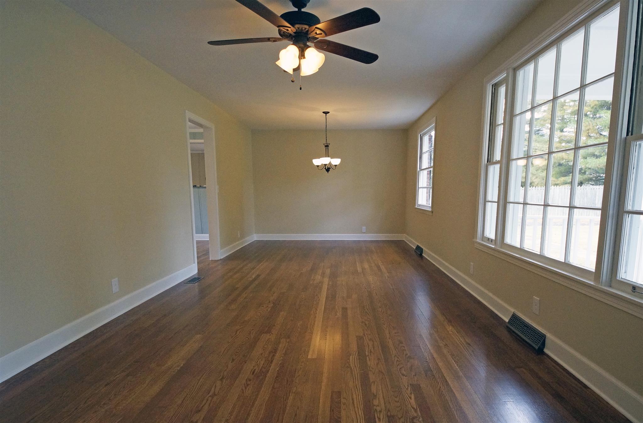 807 River Pass Madison, TN 37115 - Photo 5 of 25 wooden floor in an empty room with a window