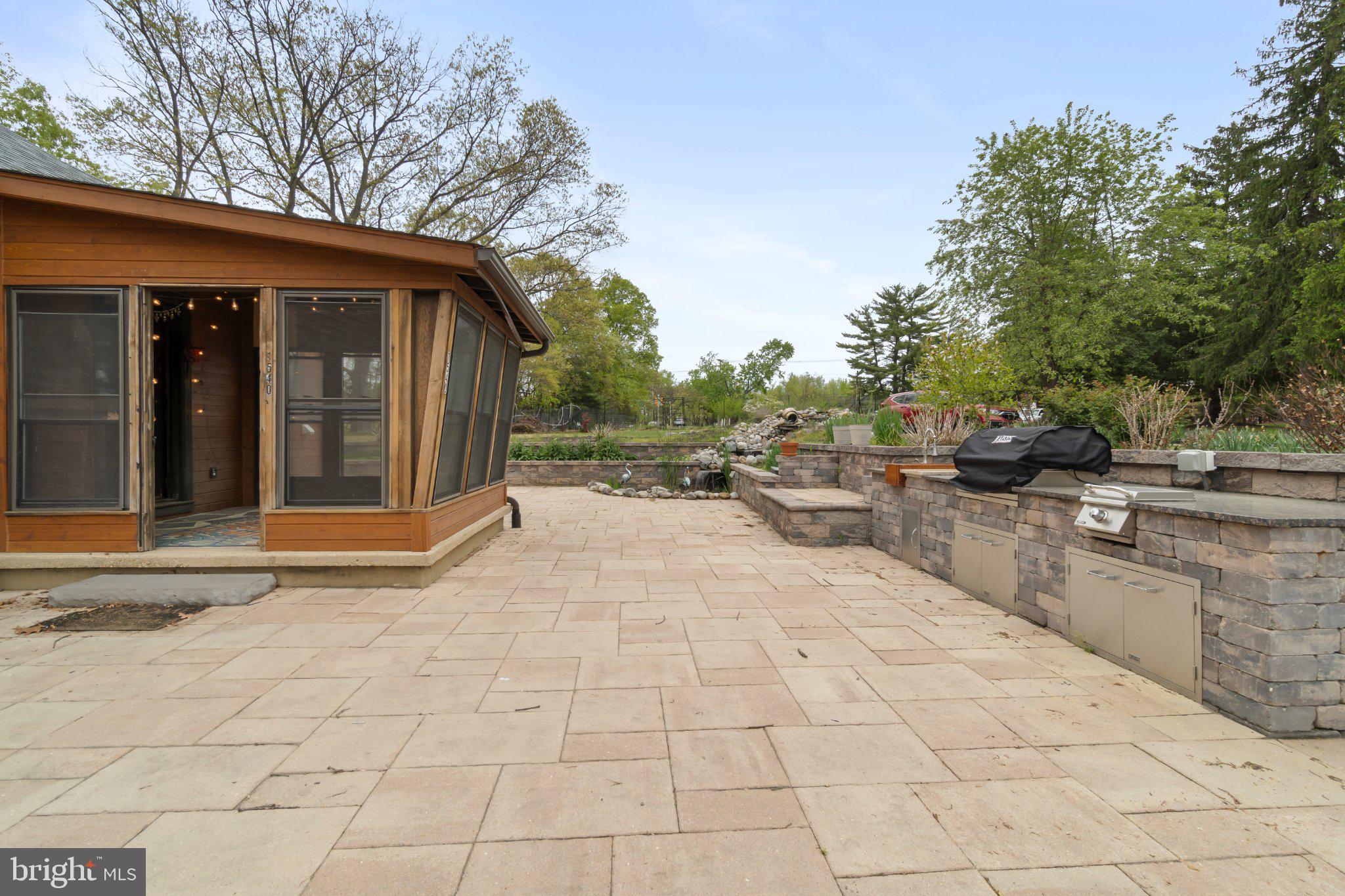 1540 Peter Cheeseman Road Blackwood, NJ 08012 - Photo 4 of 6 Serene outdoor retreat with modern flair.