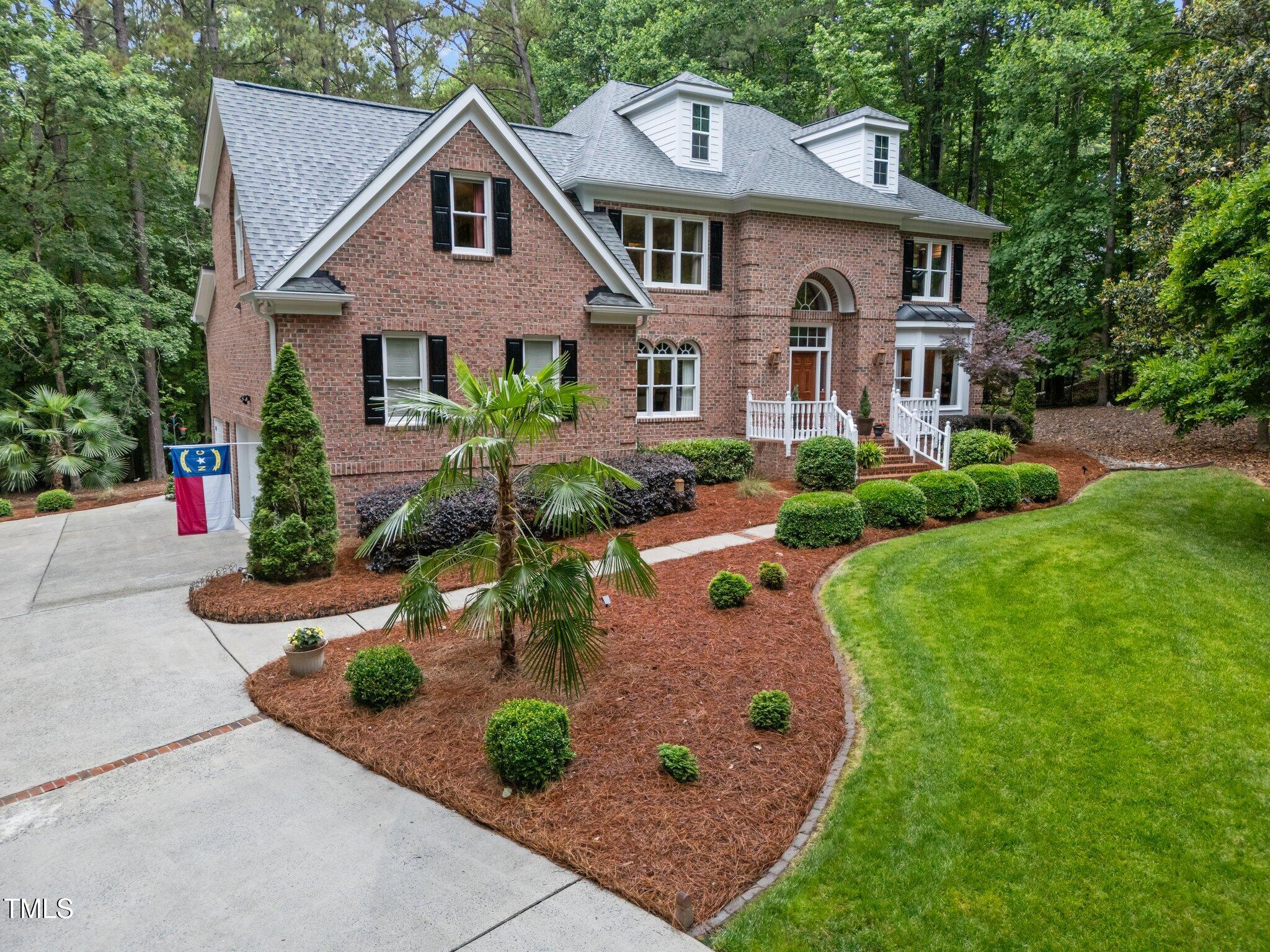 5805 Laurel Rock Lane Raleigh, NC 27613 - Photo 1 of 41 1-web-or-mls-DJI_20250527094106_0934_D