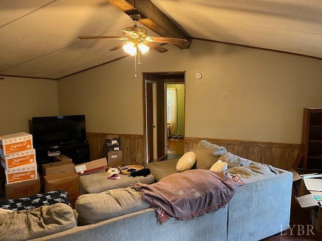 1225 Riverville Road Gladstone, VA 24553 - Photo 6 of 11 a bedroom with a bed couch and a ceiling fan