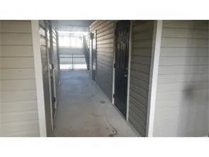 a black and white photo of a bathroom