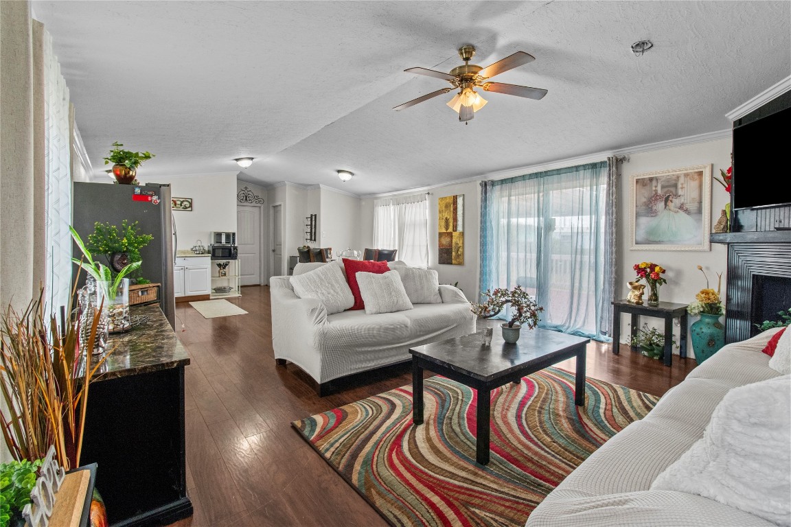706 11th Street San Leon, TX 77539 - Photo 20 of 20 a living room with furniture fireplace and flat screen tv