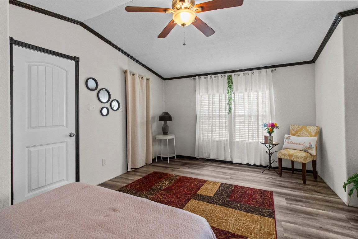 706 11th Street San Leon, TX 77539 - Photo 5 of 20 Primary bedroom with an ensuite bath.