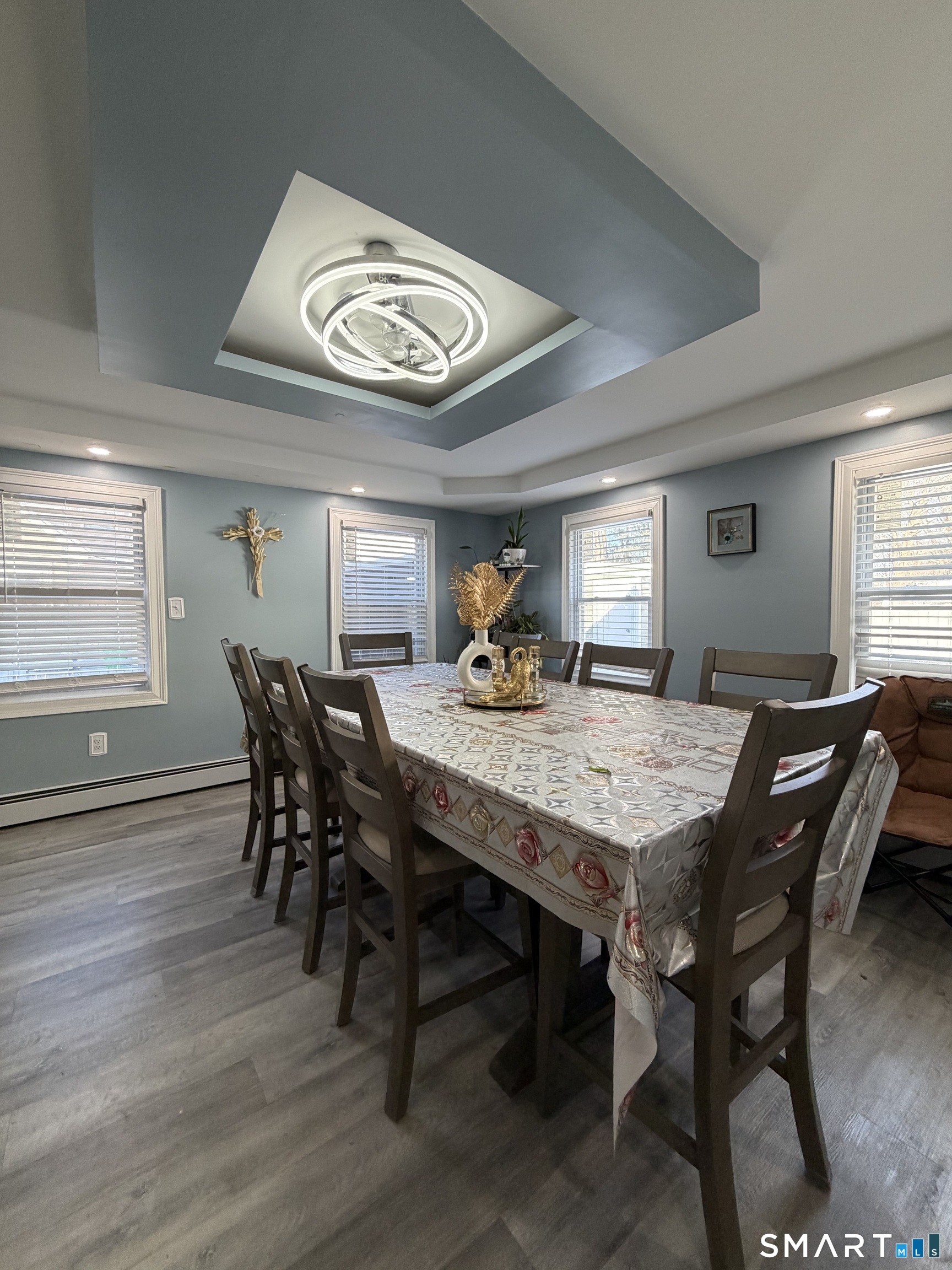 19 Maple Street Plainville, CT 06062 - Photo 11 of 25 a view of a dining room with furniture and wooden floor