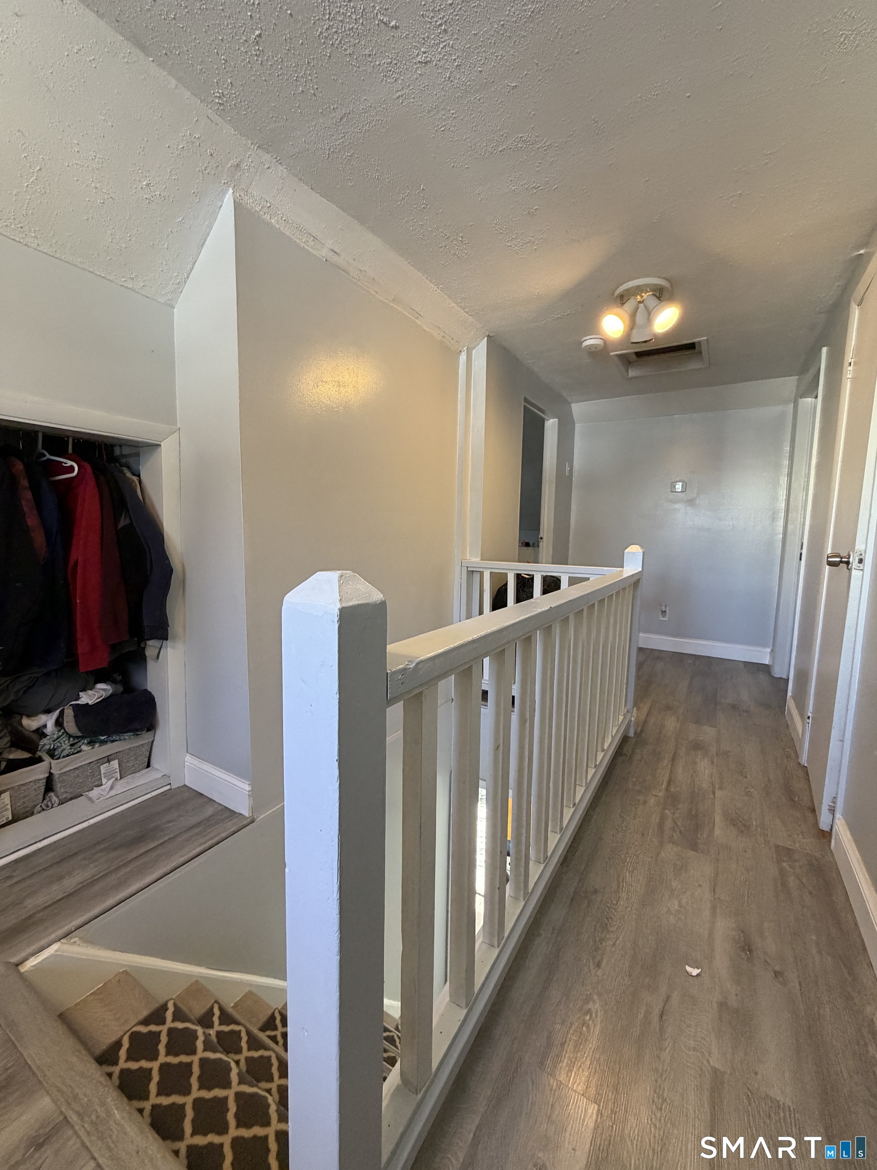 19 Maple Street Plainville, CT 06062 - Photo 17 of 25 a view of a hallway with workspace
