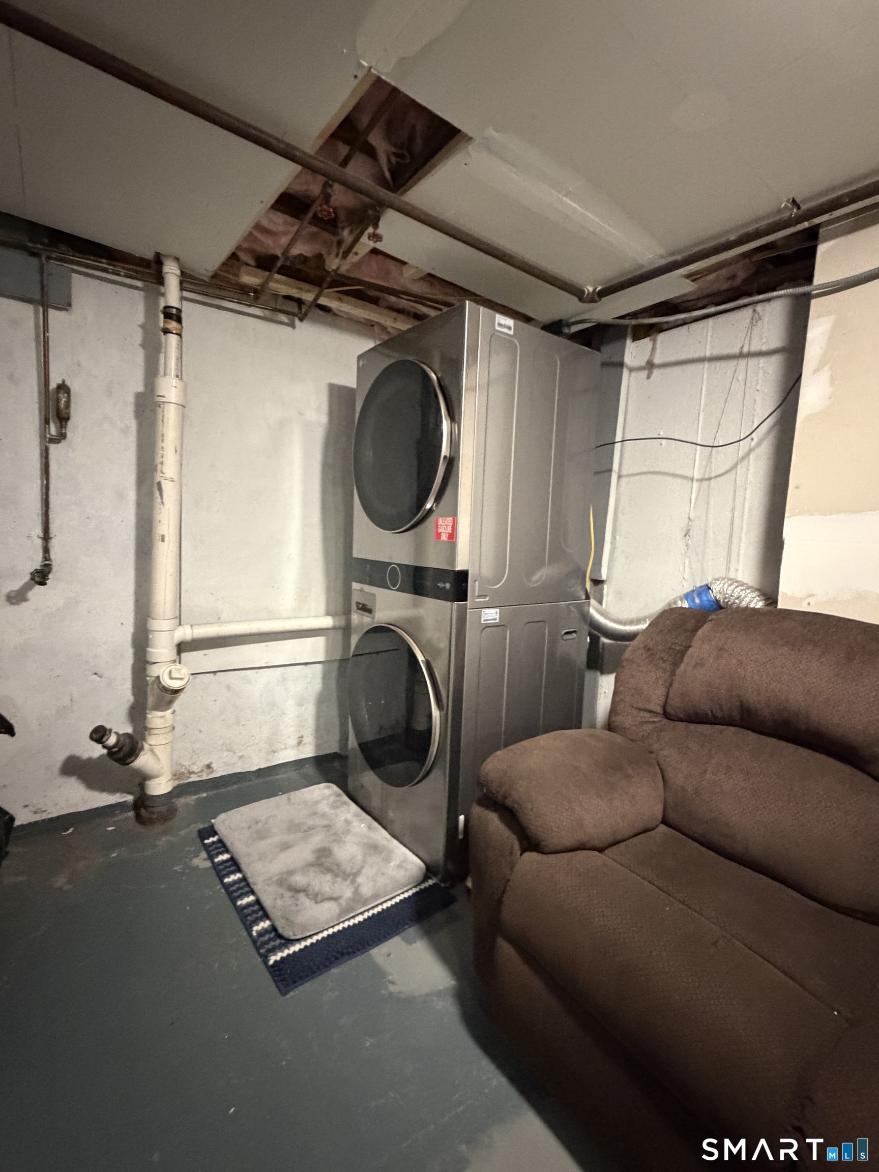19 Maple Street Plainville, CT 06062 - Photo 25 of 25 a living room with furniture and a window