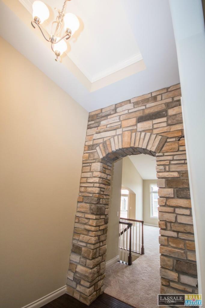 22654 Brantingham Road Macomb, MI 48044 - Photo 7 of 32 4 Lot 92 Bluffs of Beaufait Gia Ranch Spec Home Foyer Stone Entry.jpg