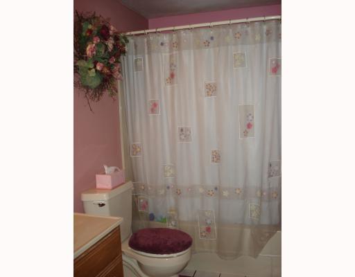 122 Fox Run Road Cranberry Township, PA 16066 - Photo 11 of 17 Other. The first floor bathroom has a shower with a bath tub with a large sink and vanity area.