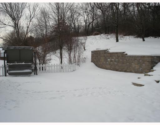 122 Fox Run Road Cranberry Township, PA 16066 - Photo 16 of 17 Yard/Garden. The back yard is level and includes a hot tub and patio with a retaining wall. The side yard is fenced in for additional privacy.
