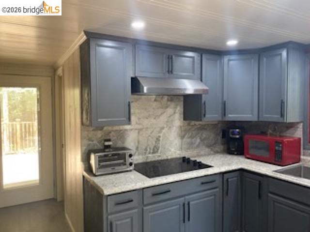 26591 Snow Bowl Road Long Barn, CA 95335 - Photo 12 of 38 a kitchen with stainless steel appliances granite countertop a sink stove and cabinets