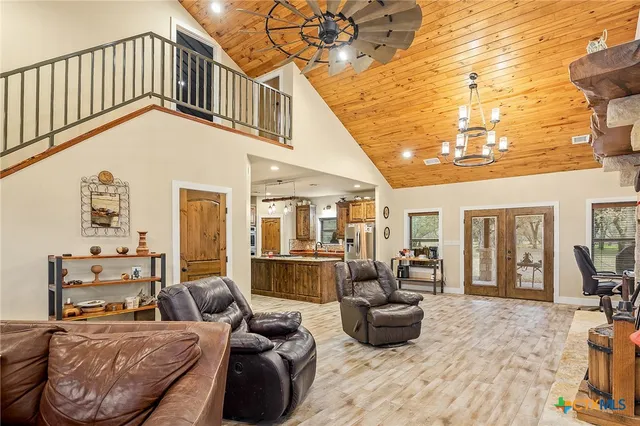 a view of a kitchen from a hallway