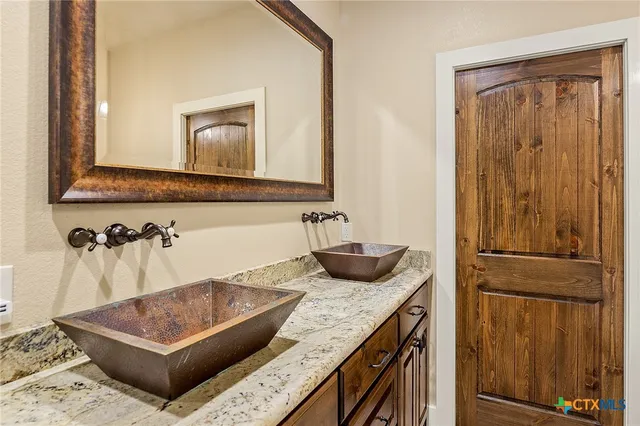 a bathroom with a sink and bathtub