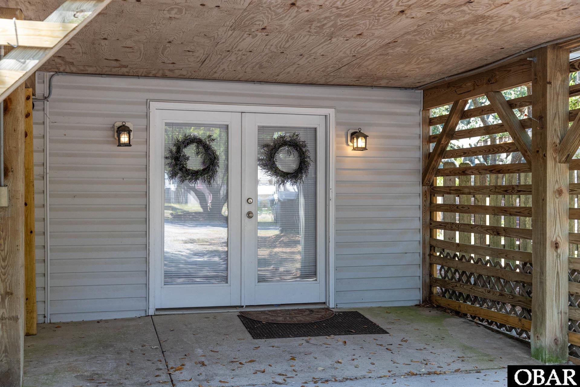 1710 Sea Swept Road Kill Devil Hills, NC 27948 - Photo 41 of 53 Entrance to storage area and laundry
