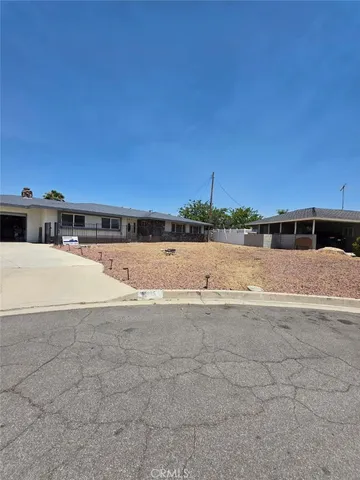 a view of ocean with large trees