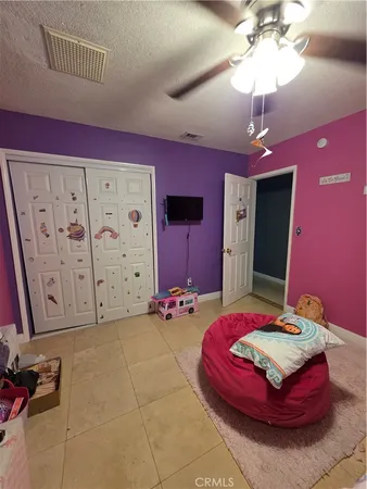 a room with a black white checkered floor
