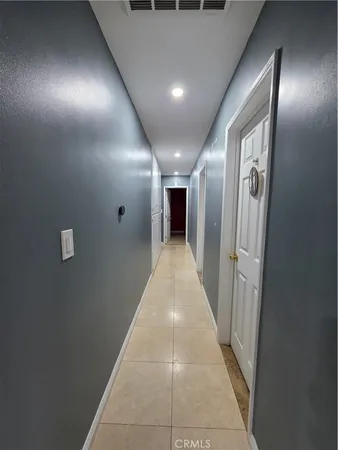a bathroom with a toilet and shower