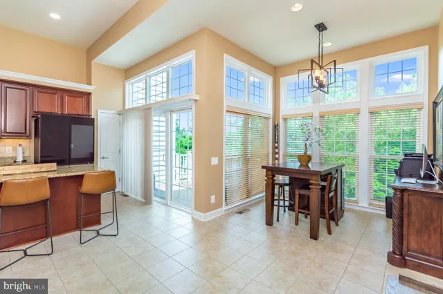 a view of a livingroom with furniture window and outside view