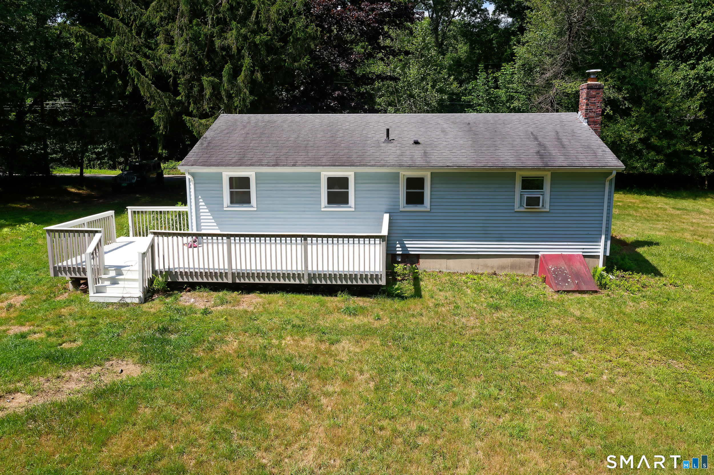 6 Chesbro Bridge Road Lebanon, CT 06249 - Photo 19 of 27 View of back of home and deck.