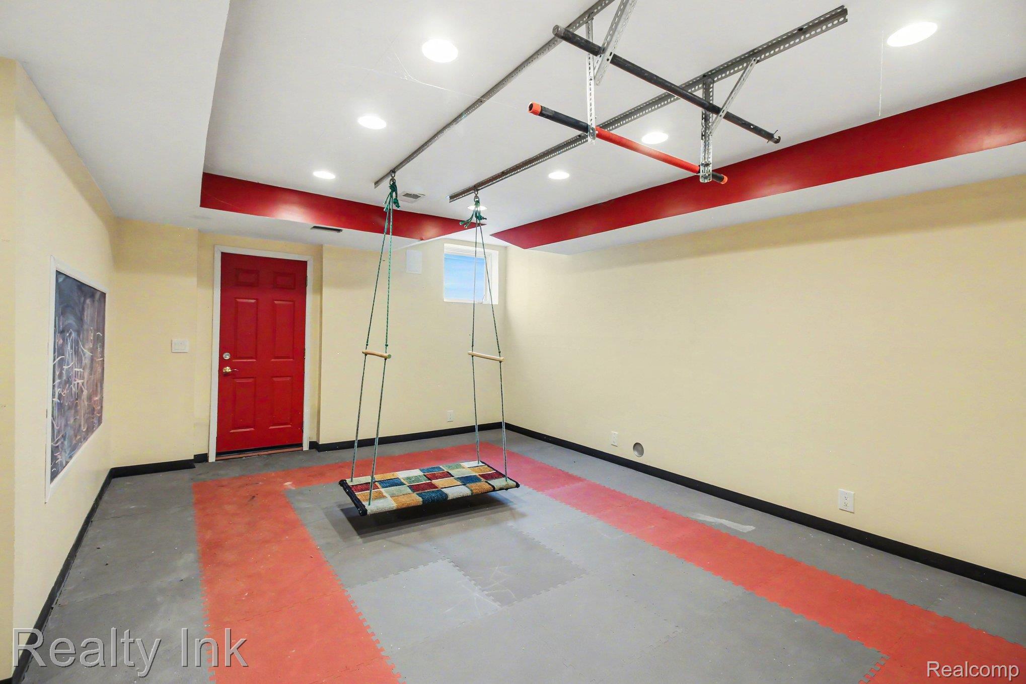 4927 Nature View Court Howell, MI 48843 - Photo 16 of 19 Garage featuring baseboards and recessed lighting