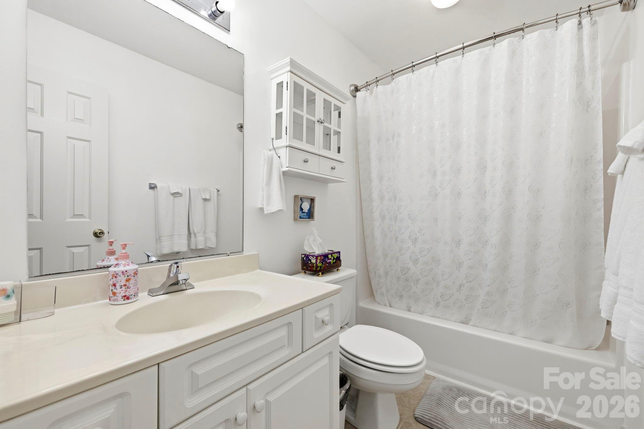 1539 Schooner Court Murrells Inlet, SC 29576 - Photo 11 of 28 a bathroom with a sink toilet and shower
