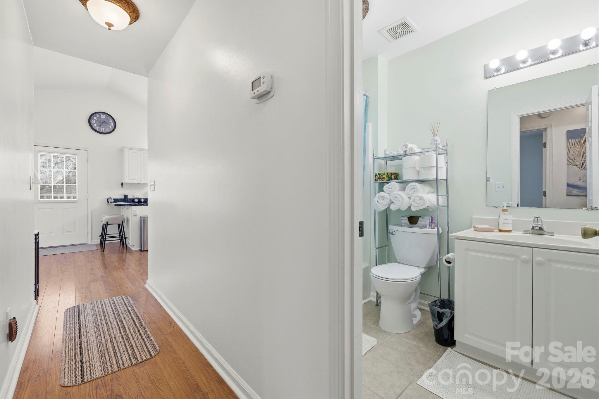 1539 Schooner Court Murrells Inlet, SC 29576 - Photo 14 of 28 a bathroom with a sink toilet and a mirror