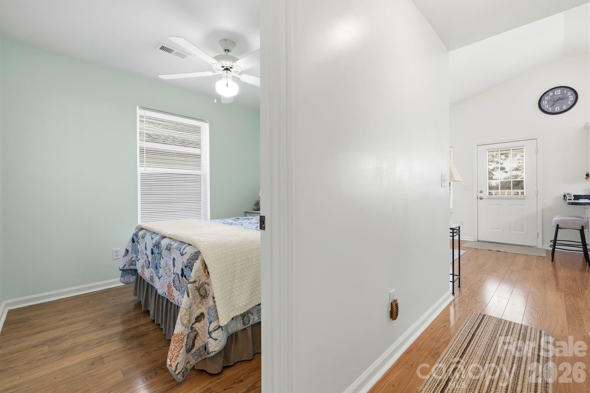 1539 Schooner Court Murrells Inlet, SC 29576 - Photo 15 of 28 a bedroom with a bed and a table