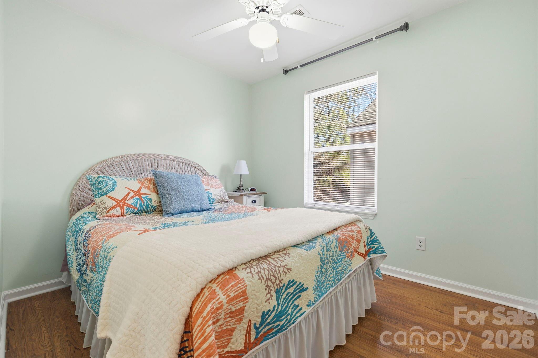 1539 Schooner Court Murrells Inlet, SC 29576 - Photo 16 of 28 a bedroom with a bed and a window