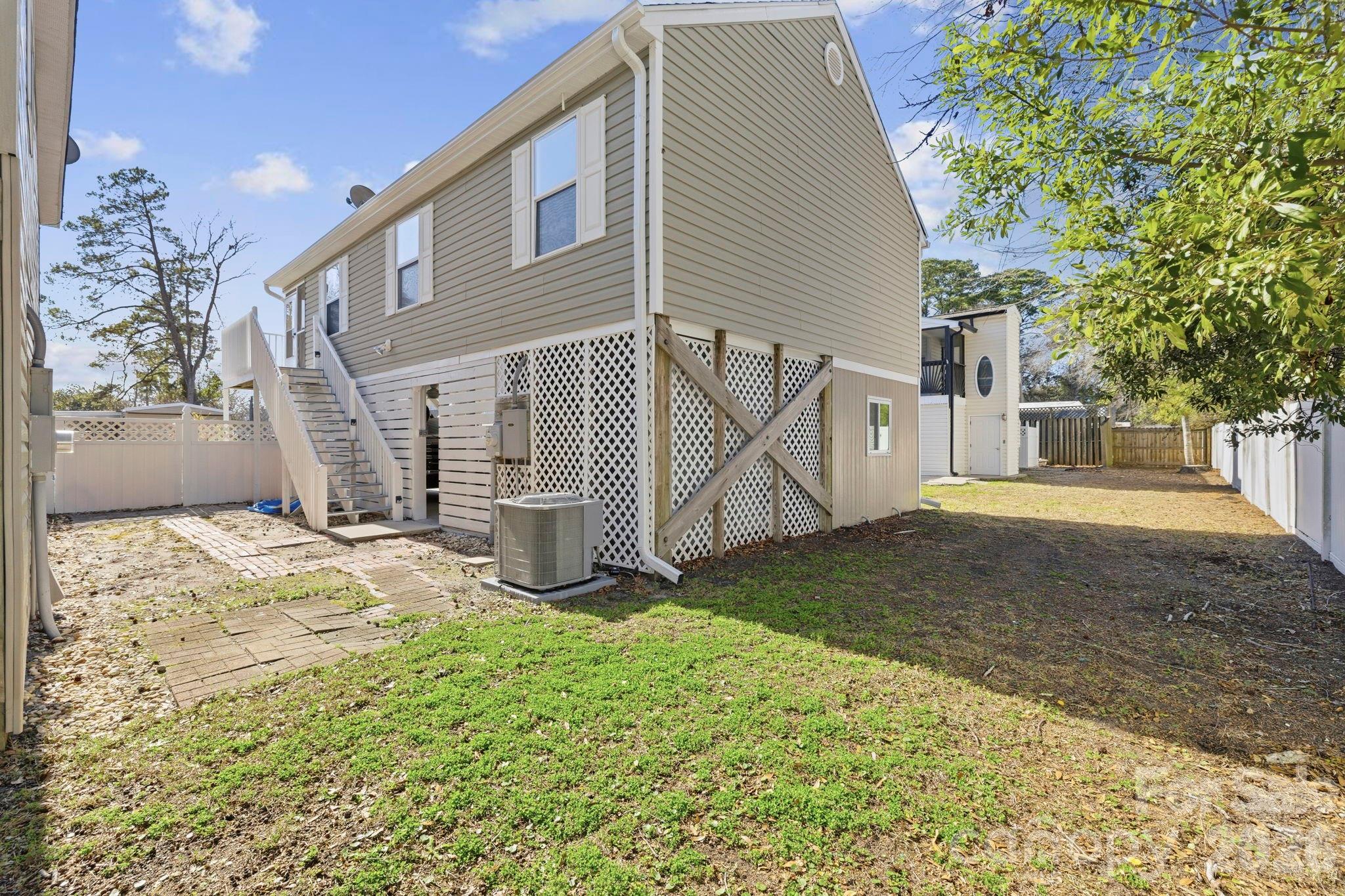 1539 Schooner Court Murrells Inlet, SC 29576 - Photo 18 of 28 a view of a house with a yard