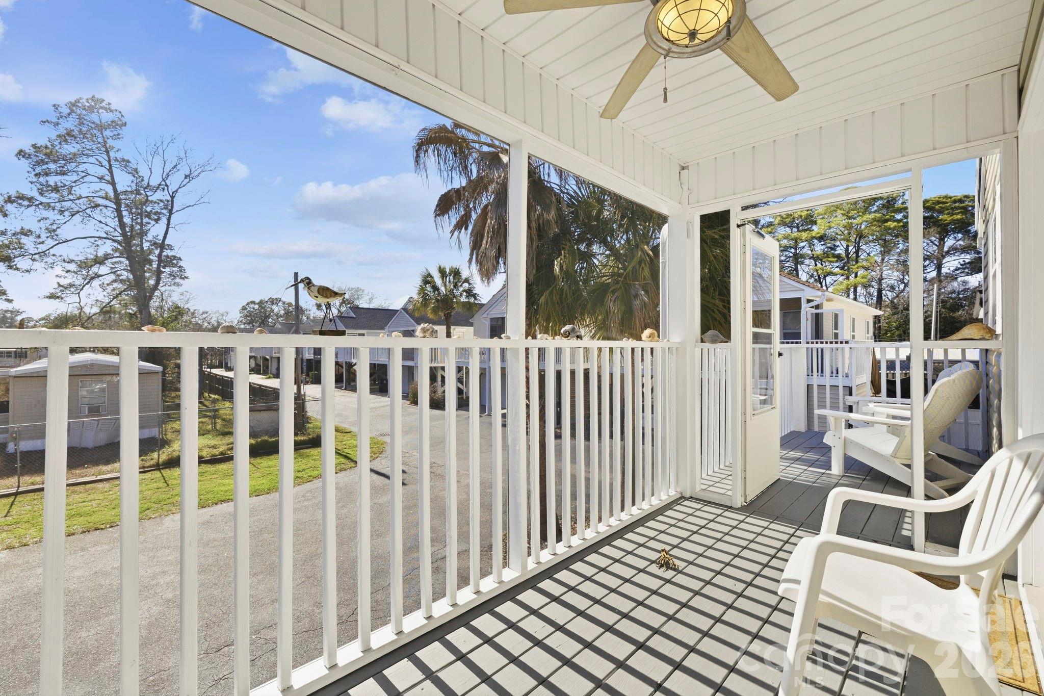 1539 Schooner Court Murrells Inlet, SC 29576 - Photo 24 of 28 a view of a balcony with wooden floor