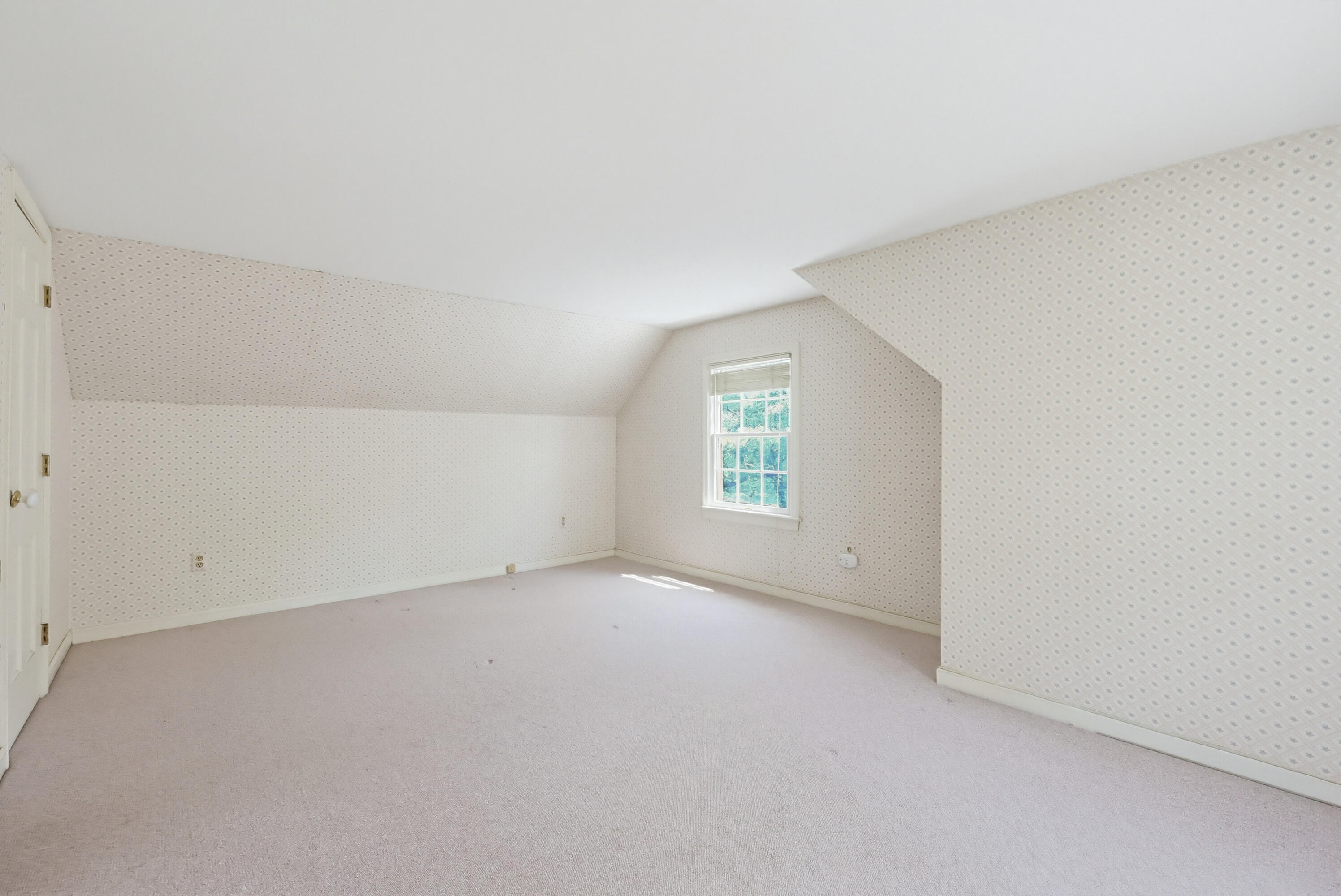 556 Cotuit Road Mashpee, MA 02649 - Photo 22 of 45 an empty room with a window