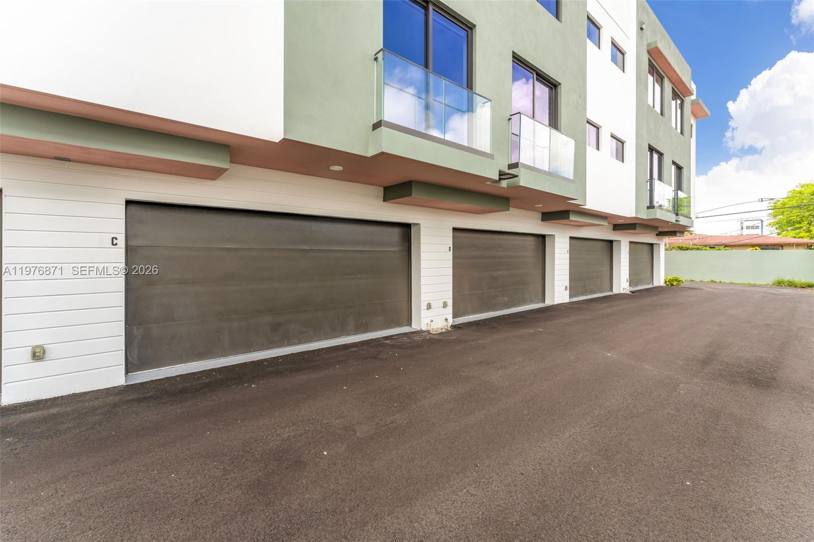 721 Southwest 11th Street, Unit F Miami, FL 33129 - Photo 25 of 36 a view of a building with a street